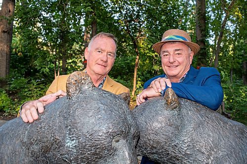 BROOK JONES / FREE PRESS
Graeme Sifton (right), who is the great-grandson of former Winnipeg Free Press owner Clifford Sifton, is all smiles as he is pictured in front of the Twin Bears statue with Jay Martin as they attend A Picnic in Provence - Garden Party 2024 at the Leo Mol Sculpture Garden at Assiniboine Park in Winnipeg, Man., Wednesday, Aug. 28, 2024. The annual fundraiser supports the Assiniboine Park Conservancy and this year's event included 500 guests.