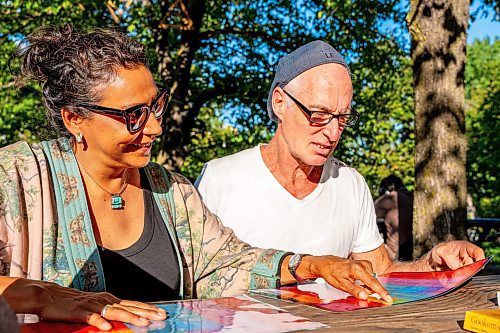 NIC ADAM / FREE PRESS
Carol Scott (left) and Christian Slomka learn some Cree and Ojibwe at the free &quot;language tables&quot; offered Wednesday through Friday evenings at the Forks.
240828 - Wednesday, August 28, 2024.

Reporter: Jen Zoratti