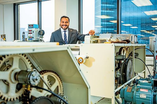 NIC ADAM / FREE PRESS
Cereals Canada CEO Dean Dias pictured next to some ramen noodle machines on the 12th floor of their building Thursday.
240829 - Thursday, August 29, 2024.

Reporter: Martin Cash