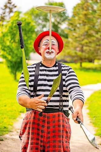 NIC ADAM / FREE PRESS
Charles Lauder aka Sleepy the Clown, pictured doing a trick at John H Coulter Park Thursday, is celebrating his 30th season clowning around this summer.
240829 - Thursday, August 29, 2024.

Reporter: AV Kitching