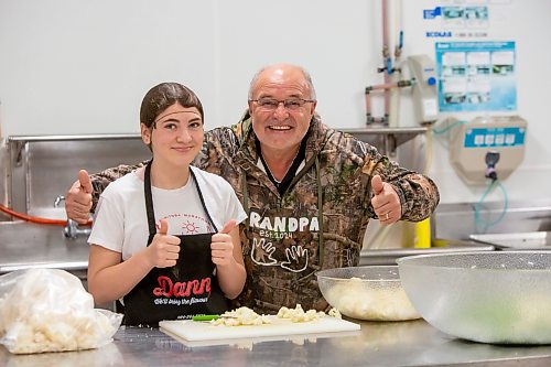 BROOK JONES ./ FREE PRESS
Danny Kleinsasser (right) of Danny's Whole Hog Barbecue &amp; Smokehouse is pictured with his youngest daughter Cassidy Kleinsasser, 14, at the family's operation at 12045 PTH 67 in the RM of Rockwood, Man., Thursday, Aug. 29, 2024.