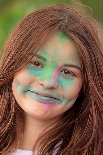 29082024
Willow Lundrigan smiles while covered in coloured powder after taking part in the CFB Shilo Fun Run 2024 hosted by CFB Shilo Community Recreation and the Shilo Military Family Resource Centre. Donations were taken for cancer research as part of the run and a free barbecue was served after. 
(Tim Smith/The Brandon Sun)