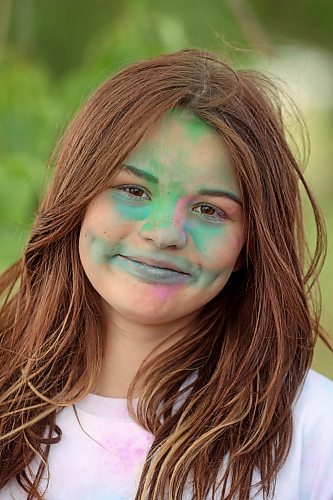 29082024
Willow Lundrigan smiles while covered in coloured powder after taking part in the CFB Shilo Fun Run 2024 hosted by CFB Shilo Community Recreation and the Shilo Military Family Resource Centre. Donations were taken for cancer research as part of the run and a free barbecue was served after. 
(Tim Smith/The Brandon Sun)