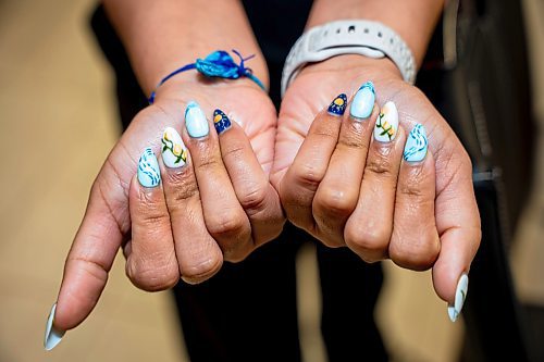 NIC ADAM / FREE PRESS
Receptionist Gagan Bhullar shows off her nails she got done at Almond Nail Bar&#x2019;s flagship store in St. Vital.
240830 - Friday, August 30, 2024.

Reporter: Gabby