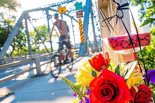 NIC ADAM / FREE PRESS
Family and supporters block off the Harry Lazarenko Bridge Friday evening after Doris Porter was struck and killed on the bridge on August 10th. 
240830 - Friday, August 30, 2024.

Reporter: Jura