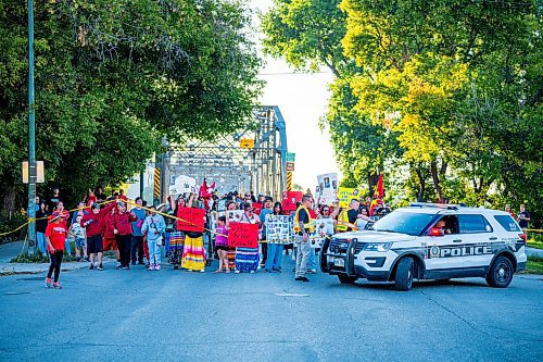 NIC ADAM / FREE PRESS
Family and supporters block off the Harry Lazarenko Bridge  Friday evening after Doris Porter was struck and killed on the bridge on August 10th. 
240830 - Friday, August 30, 2024.

Reporter: Jura