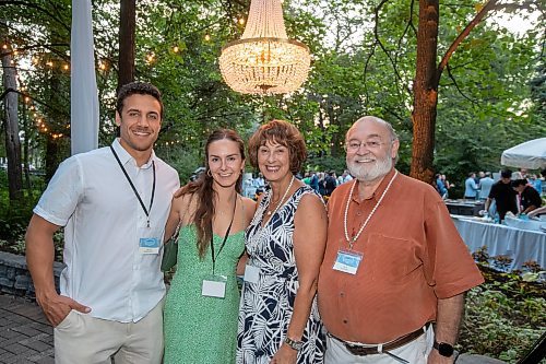 BROOK JONES / FREE PRESS
Allison Slonosky (second from far left) is pictured with her partner Dallas McDougall (left), her mom Liz Marr (second from far right) and her dad Nick Slonosky (right) at A Picnic in Provence - Garden Party 2024 at the Leo Mol Sculpture Garden at Assiniboine Park in Winnipeg, Man., Wednesday, Aug. 28, 2024. The annual fundraiser supports the Assiniboine Park Conservancy and this year's event included 500 guests.