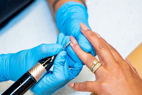 NIC ADAM / FREE PRESS
Nail tech Rajni Devi gives a manicure to Aihlene Alvarado at Almond Nail Bar&#x2019;s flagship store in St. Vital.
240830 - Friday, August 30, 2024.

Reporter: Gabby