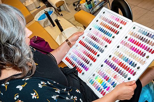 NIC ADAM / FREE PRESS
First time customer Rachelle Tetrault picks a nail colour at Almond Nail Bar&#x2019;s flagship store in St. Vital, which is its biggest yet.
240830 - Friday, August 30, 2024.

Reporter: Gabby