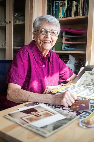 MIKAELA MACKENZIE / WINNIPEG FREE PRESS

Carol Briggs, one of the first female RCMP officers, goes through memorabilia from her time in the force on Friday, Aug. 30, 2024. The RCMP is celebrating 50 years since the first female RCMP officers graduated from their program.

For Jura story.
Winnipeg Free Press 2024