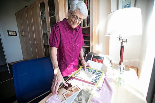 MIKAELA MACKENZIE / WINNIPEG FREE PRESS

Carol Briggs, one of the first female RCMP officers, goes through memorabilia from her time in the force on Friday, Aug. 30, 2024. The RCMP is celebrating 50 years since the first female RCMP officers graduated from their program.

For Jura story.
Winnipeg Free Press 2024