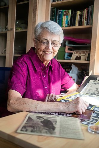 MIKAELA MACKENZIE / WINNIPEG FREE PRESS

Carol Briggs, one of the first female RCMP officers, goes through memorabilia from her time in the force on Friday, Aug. 30, 2024. The RCMP is celebrating 50 years since the first female RCMP officers graduated from their program.

For Jura story.
Winnipeg Free Press 2024