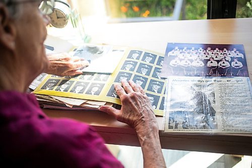 MIKAELA MACKENZIE / WINNIPEG FREE PRESS

Carol Briggs, one of the first female RCMP officers, goes through memorabilia from her time in the force on Friday, Aug. 30, 2024. The RCMP is celebrating 50 years since the first female RCMP officers graduated from their program.

For Jura story.
Winnipeg Free Press 2024