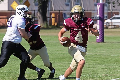 30082024
#4 of the Crocus Plainsmen runs the ball during a high school football scrimmage against the Vincent Massey Vikings at Vincent Massey High School on Friday in advance of the regular season. 
(Tim Smith/The Brandon Sun)