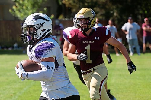 30082024
#28 of the Vincent Massey Vikings runs the ball during a high school football scrimmage against the Crocus Plainsmen at Vincent Massey High School on Friday in advance of the regular season. 
(Tim Smith/The Brandon Sun)