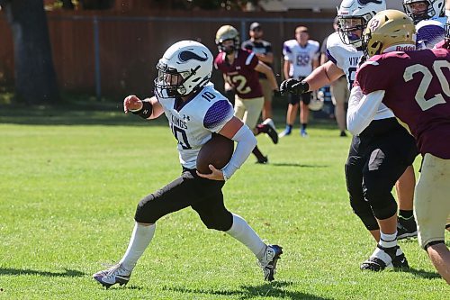 30082024
Quarterback #10 of the Vincent Massey Vikings runs the ball during a high school football scrimmage against the Crocus Plainsmen at Vincent Massey High School on Friday in advance of the regular season. 
(Tim Smith/The Brandon Sun)