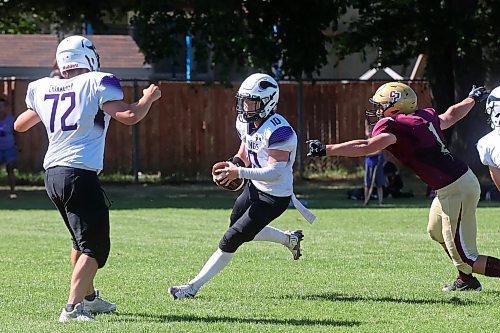 30082024
#10 of the Vincent Massey Vikings runs the ball during a high school football scrimmage against the Crocus Plainsmen at Vincent Massey High School on Friday in advance of the regular season. 
(Tim Smith/The Brandon Sun)