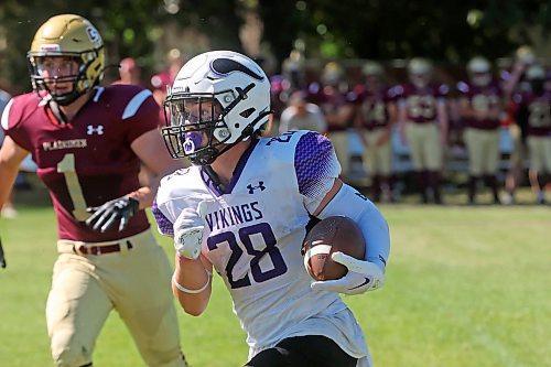 30082024
#28 of the Vincent Massey Vikings runs the ball during a high school football scrimmage against the Crocus Plainsmen at Vincent Massey High School on Friday in advance of the regular season. 
(Tim Smith/The Brandon Sun)