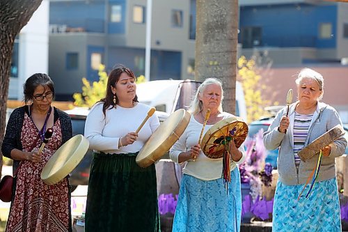 30082024
Drummers Brenda Nugent, Annalee Flett, Audrey Graham and Deborah Tacan perform a wildflower song prior to the International Toxic Drug Poisoning Awareness Day walk in downtown Brandon on Friday. The walk began and ended at Princess Park and was followed by speakers and a lunch.  (Tim Smith/The Brandon Sun)