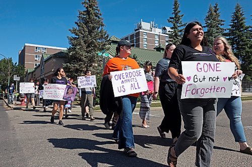 30082024
Participants take part in the International Toxic Drug Poisoning Awareness Day walk in downtown Brandon on Friday. The walk began and ended at Princess Park and was followed by speakers and a lunch.  (Tim Smith/The Brandon Sun)