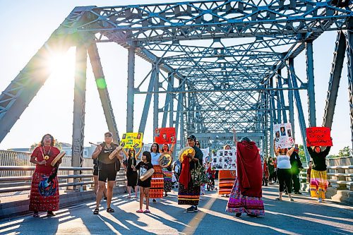 NIC ADAM / FREE PRESS
Family and supporters block off the Harry Lazarenko Bridge  Friday evening after Doris Porter was struck and killed on the bridge on August 10th. 
240830 - Friday, August 30, 2024.

Reporter: Jura