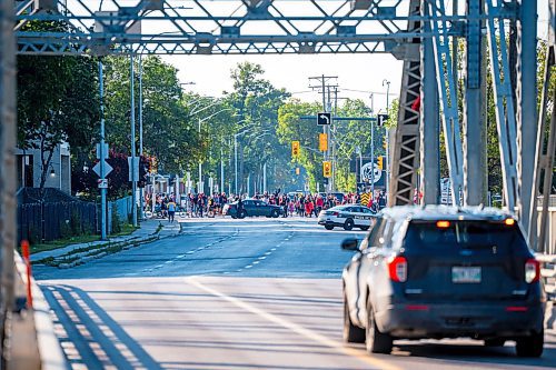 NIC ADAM / FREE PRESS
Family and supporters block off the Harry Lazarenko Bridge Friday evening after Doris Porter was struck and killed on the bridge on August 10th. 
240830 - Friday, August 30, 2024.

Reporter: Jura