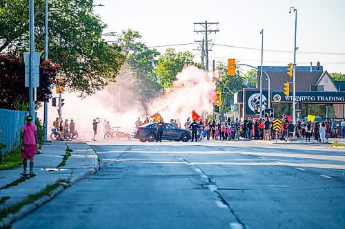 NIC ADAM / FREE PRESS
Family and supporters block off the Harry Lazarenko Bridge Friday evening after Doris Porter was struck and killed on the bridge on August 10th. 
240830 - Friday, August 30, 2024.

Reporter: Jura