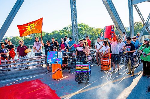 NIC ADAM / FREE PRESS
Family and supporters block off the Harry Lazarenko Bridge  Friday evening after Doris Porter was struck and killed on the bridge on August 10th. 
240830 - Friday, August 30, 2024.

Reporter: Jura