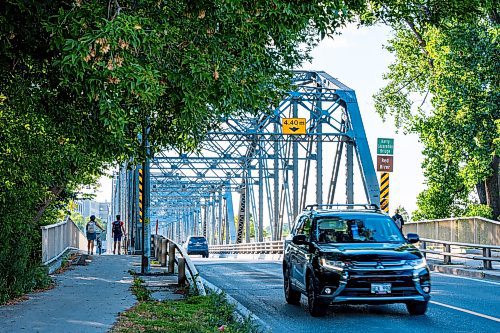 NIC ADAM / FREE PRESS
Family and supporters block off the Harry Lazarenko Bridge Friday evening after Doris Porter was struck and killed on the bridge on August 10th. 
240830 - Friday, August 30, 2024.

Reporter: Jura