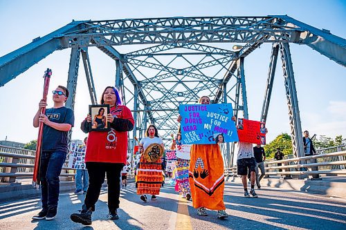 NIC ADAM / FREE PRESS
Family and supporters block off the Harry Lazarenko Bridge  Friday evening after Doris Porter was struck and killed on the bridge on August 10th. 
240830 - Friday, August 30, 2024.

Reporter: Jura