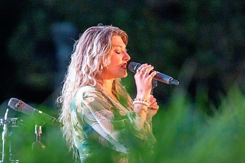 BROOK JONES / FREE PRESS
Singer Sheena Rattai of Big City All Star Band performs during A Picnic in Provence - Garden Party 2024 at the Leo Mol Sculpture Garden at Assiniboine Park in Winnipeg, Man., Wednesday, Aug. 28, 2024. The annual fundraiser supports the Assiniboine Park Conservancy and this year's event included 500 guests.