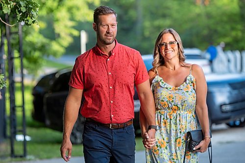 BROOK JONES / FREE PRESS
Eric Stewart (left) and his wife Desirae Stewart arrive at A Picnic in Provence - Garden Party 2024 at the Leo Mol Sculpture Garden at Assiniboine Park in Winnipeg, Man., Wednesday, Aug. 28, 2024. The annual fundraiser supports the Assiniboine Park Conservancy and this year's event included 500 guests.