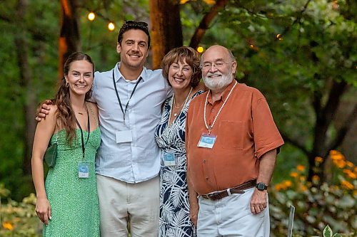 BROOK JONES / FREE PRESS
Allison Slonosky (second from far left) is pictured with her partner Dallas McDougall (left), her mom Liz Marr (second from far right) and her dad Nick Slonosky (right) at A Picnic in Provence - Garden Party 2024 at the Leo Mol Sculpture Garden at Assiniboine Park in Winnipeg, Man., Wednesday, Aug. 28, 2024. The annual fundraiser supports the Assiniboine Park Conservancy and this year's event included 500 guests.