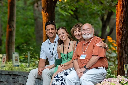 BROOK JONES / FREE PRESS
Allison Slonosky (second from far left) is pictured with her partner Dallas McDougall (left), her mom Liz Marr (second from far right) and her dad Nick Slonosky (right) at A Picnic in Provence - Garden Party 2024 at the Leo Mol Sculpture Garden at Assiniboine Park in Winnipeg, Man., Wednesday, Aug. 28, 2024. The annual fundraiser supports the Assiniboine Park Conservancy and this year's event included 500 guests.