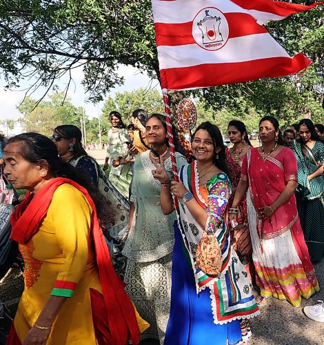 Members of the BAPS Hindu temple in Brandon parade out of the Keystone Centre on Saturday during a ceremony for the inauguration of their first temple in Brandon. (Connor McDowell/Brandon Sun)