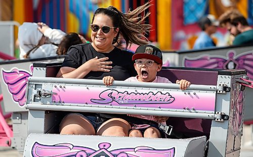 JOHN WOODS / FREE PRESS
Dominique and son Nash enjoy a ride on the Scrambler during the Fall Fair at Red River Exhibition Park in Winnipeg Sunday, September 1, 2024. 

Reporter: jura