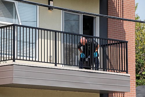 JOHN WOODS / FREE PRESS
Police investigate a scene at 153 Aubert St in Winnipeg Sunday, September 1, 2024. 

Reporter: jura