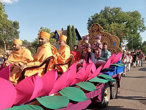 The parade makes its way down Eighth Street on Saturday. Floats were made to represent sacred images in the Hindu religion. (John Gleeson/The Brandon Sun)