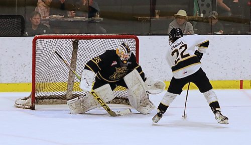 Team Black goalie Dylan McFadyen (35) successfully watches Team Gold forward Maddox Gandha (22) during the shootout at the annual Black and Gold intrasquad game involving Brandon Wheat Kings veterans and prospects at J&amp;G Homes Arena on Monday afternoon. (Perry Bergson/The Brandon Sun)
Sept. 3, 2024