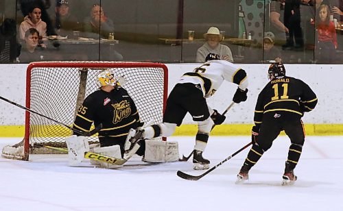 Team Black goalie Dylan McFadyen (35) gets his toe on the puck as Team Gold forward Nick Johnson (26) dekes under the watchful eye of defenceman Dylan Ronald (11) during the annual Black and Gold intrasquad game involving Brandon Wheat Kings veterans and prospects at J&amp;G Homes Arena on Monday afternoon. (Perry Bergson/The Brandon Sun)
Sept. 3, 2024