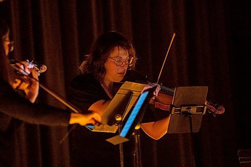 BROOK JONES / FREE PRESS
Elise Lavall&#xe9;e peforms on the viloa during A Tribute To Coldplay as part of the Fever Candlelight Series at the Winnipeg Art Gallery in Winnipeg, Man., Friday, Aug. 30, 2024. Musicians also performing from the Listeso Music Group while surrounded by candles on stage are Elation Pauls on violin, Chris Anstey on fiddle and Samuel Nadurak performs on cello.