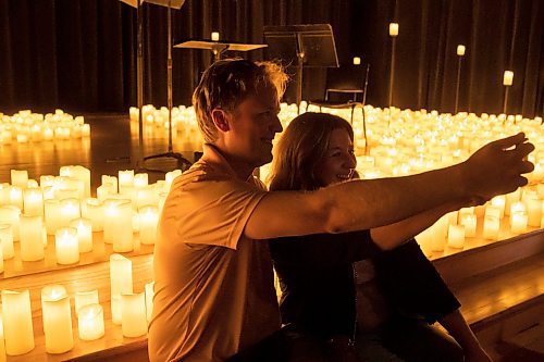 BROOK JONES / FREE PRESS
Kris Bulat (left) takes a selfie with his girlfriend Vanessa LaCoste after watching A Tribute To Coldplay as part of the Fever Candlelight Series at the Winnipeg Art Gallery in Winnipeg, Man., Friday, Aug. 30, 2024. Musicians from the Listeso Music Group which included Elation Pauls on violin, Chris Anstey on fiddle, Elise Lavall&#xe9;e on viloa and Samuel Nadurak on cello were surrounded by candles on stage as they performed 11 songs during a 65 minute program.