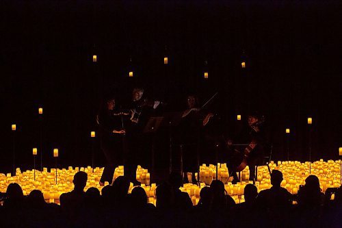 BROOK JONES / FREE PRESS
Musicians from the Listeso Music Group which include (clockwise from far left) Elation Pauls on violin, Chris Anstey on fiddle, Elise Lavall&#xe9;e on viloa and Samuel Nadurak on cello perform on stage as they are surrounded by candles during A Tribute To Coldplay as part of the Fever Candlelight Series at the Winnipeg Art Gallery in Winnipeg, Man., Friday, Aug. 30, 2024.