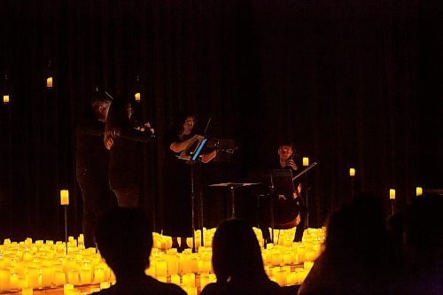 BROOK JONES / FREE PRESS
Musicians from the Listeso Music Group which include (clockwise from lower left) Elation Pauls on violin, Chris Anstey on fiddle, Elise Lavall&#xe9;e on viloa and Samuel Nadurak on cello perform on stage as they are surrounded by candles during A Tribute To Coldplay as part of the Fever Candlelight Series at the Winnipeg Art Gallery in Winnipeg, Man., Friday, Aug. 30, 2024.