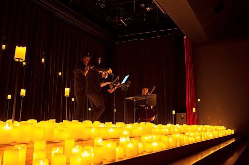 BROOK JONES / FREE PRESS
Musicians from the Listeso Music Group which include (clockwise from lower left) Elation Pauls on violin, Chris Anstey on fiddle, Elise Lavall&#xe9;e on viloa and Samuel Nadurak on cello perform on stage as they are surrounded by candles during A Tribute To Coldplay as part of the Fever Candlelight Series at the Winnipeg Art Gallery in Winnipeg, Man., Friday, Aug. 30, 2024.