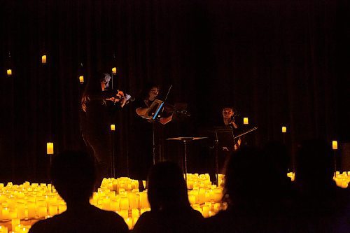 BROOK JONES / FREE PRESS
Musicians from the Listeso Music Group which include (clockwise from lower left) Elation Pauls on violin, Chris Anstey on fiddle, Elise Lavall&#xe9;e on viloa and Samuel Nadurak on cello perform on stage as they are surrounded by candles during A Tribute To Coldplay as part of the Fever Candlelight Series at the Winnipeg Art Gallery in Winnipeg, Man., Friday, Aug. 30, 2024.