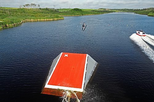 19082024
Ski jumper Casey Mommer soars through the air off a jump while training on a tiny, narrow, secluded lake on the Manitoba prairie in August for the World Over-35 Waterski Championships in Spain. Mommer has been competing in world-class waterski events for most of his life and placed second in ski jumping at the 2022 World Over-35 Waterski Championships in France and third at the 2018 World Over-35 Waterski Championships in Chile.
(Tim Smith/The Brandon Sun)