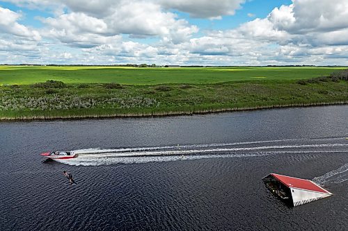 19082024
Ski jumper Casey Mommer soars through the air off a jump while training on a tiny, narrow, secluded lake on the Manitoba prairie in August for the World Over-35 Waterski Championships in Spain. Mommer has been competing in world-class waterski events for most of his life and placed second in ski jumping at the 2022 World Over-35 Waterski Championships in France and third at the 2018 World Over-35 Waterski Championships in Chile.
(Tim Smith/The Brandon Sun)