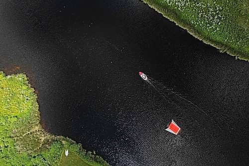 19082024
An aerial view of the thin, small body of water surrounded by prairie where world-class ski jumper Casey Mommer trains in Westman. Mommer, who grew up training at some of the best waterski training areas in the world, namely in Florida, now trains to compete at the top of his sport on the Manitoba prairie. (Tim Smith/The Brandon Sun)default