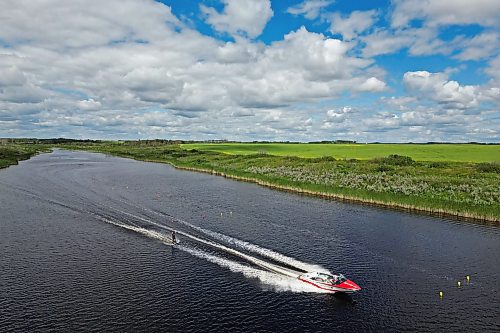 05082024
Ski jumper Casey Mommer is pulled by a boat along the thin, small body of water surrounded by prairie. Mommer, who grew up training at some of the best waterski training areas in the world, namely in Florida, now trains to compete at the top of his sport on the Manitoba prairie. (Tim Smith/The Brandon Sun).